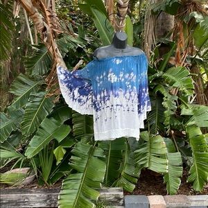 Surf. Gypsy tie-dye off the shoulder, ruffled and crochet blouse.